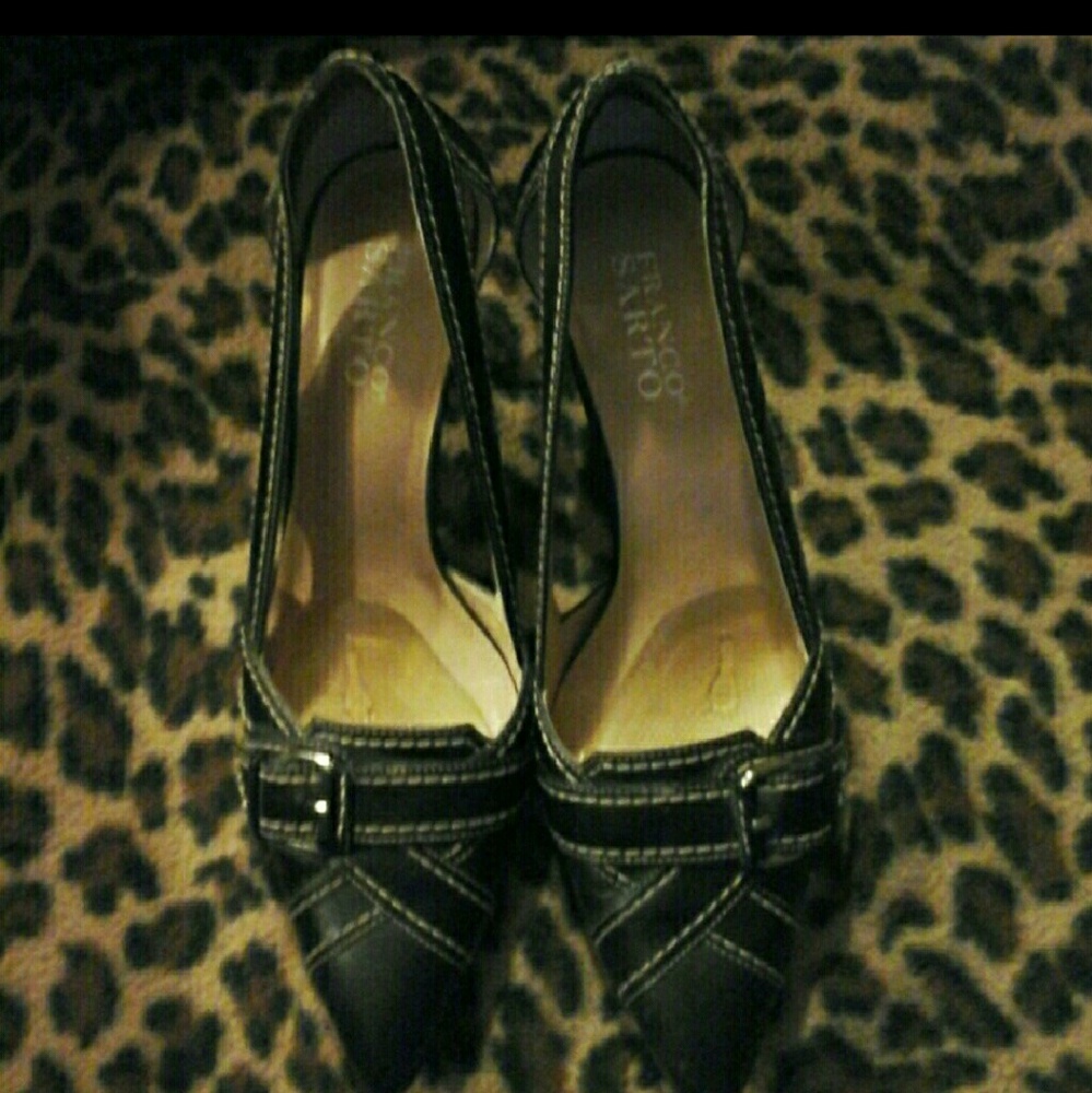 Black leather pumps
